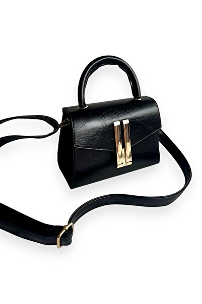 Daj Company Золота сумка з ручками та ременем через плече