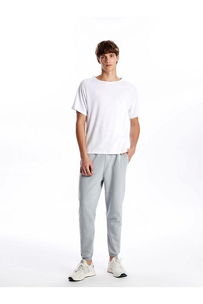 LC Waikiki Ανδρικό αθλητικό παντελόνι Jogger XSIDE ACTIVE Grey Slim Fit