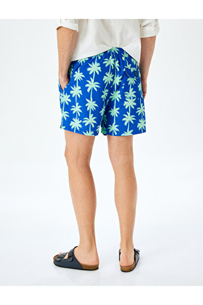 Koton Übergroße, taillierte Badeshorts mit Palmenmuster