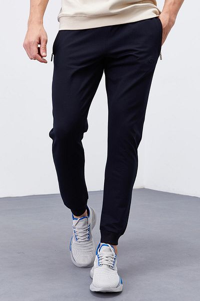 TOMMY LIFE Pantaloni de sport pentru bărbați, albastru bleumarin, strânși, cu buzunare cu fermoar - 84343