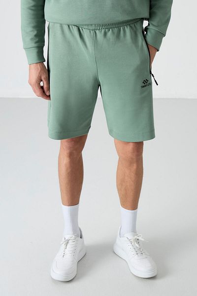 TOMMY LIFE Světle zelené pánské kraťasy – skrytý zip, zadní kapsa, šněrování, standardní velikost – 81136