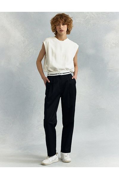 KYR Black Pile Detail Carrot Trousers with Logo