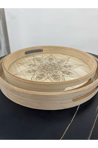 Living Set of 2 serving trays, round wood with a glass top.