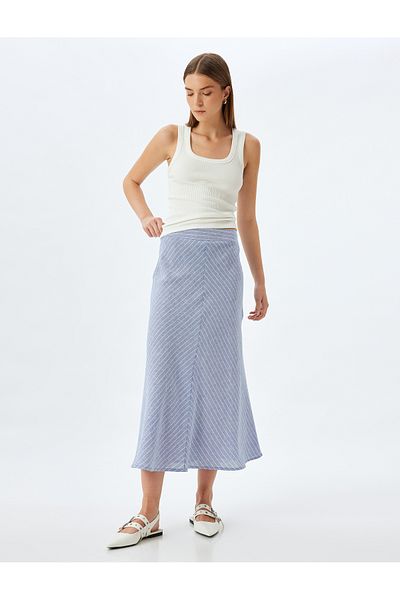 Koton Medium rise midi linen flared skirt.