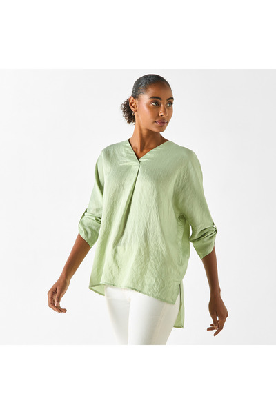 FAV بلوزة ذات رقبة على شكل حرف V وأكمام طويلة