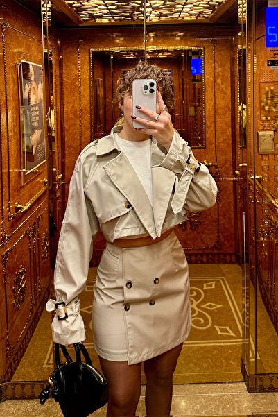 Damla Demli بدلة معطف واق من المطر بتفاصيل أزرار