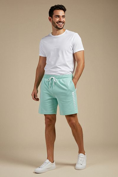 Trendyol Collection Mintfarbene Shorts mit geometrischem Aufdruck in mittlerer Größe – Normale Schnittform TMNSS21SR0137