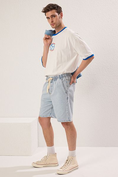 Trendyol Collection Світло-блакитні джинсові шорти на резинці TMNSS25SR00032