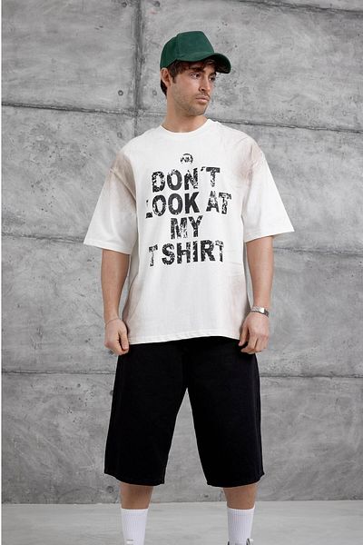 NOMARC Λευκή T-shirt Oversize με γραφή "Don't Look At My Tshirt"