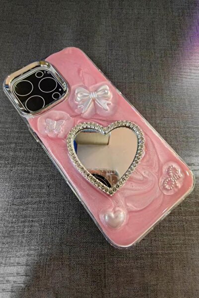 TAKIŞTIR Pembe Renk Kalp Ve Kurdele Figürlü Ayna Detaylı 14 Pro Max Telefon K...