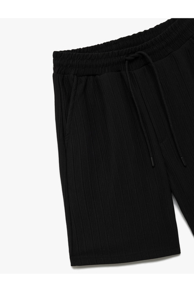 Koton Cep Detaylı Dokulu Beli Bağcıklı Şort