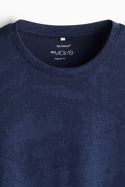 H&M قميص رياضي من DryMove™