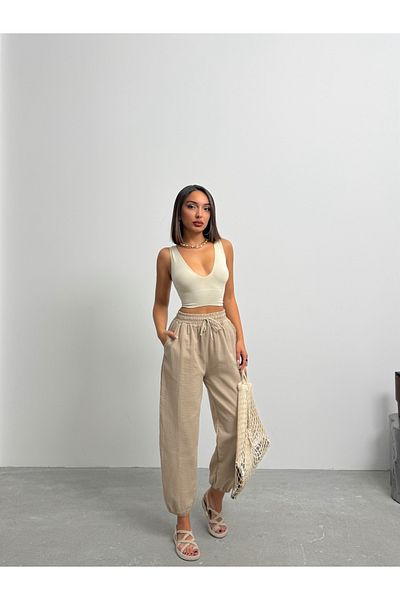 BEJNA Beigefarbene Ballonhose aus strukturiertem Leinen mit Taschen für Damen