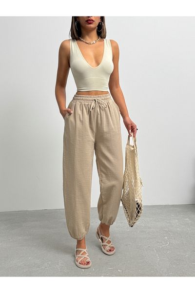 BEJNA Beigefarbene Ballonhose aus strukturiertem Leinen mit Taschen für Damen