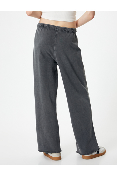 Koton Šněrovací kalhoty se širokými nohavicemi a vybledlým efektem v pase