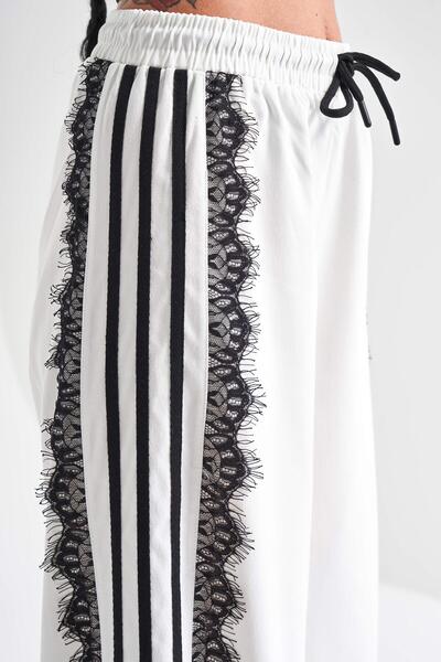 its basic Women's White Color Side Stripe Lace Detailed Design Fabric Trousers
