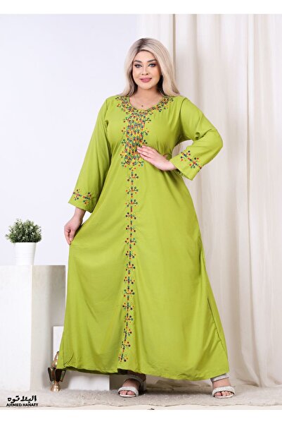 Genrics A comfortable and flowing cotton reception gown with embroidery on the chest and length of the model.