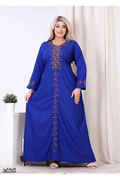 Genrics A comfortable and flowing cotton reception gown with embroidery on the chest and length of the model.