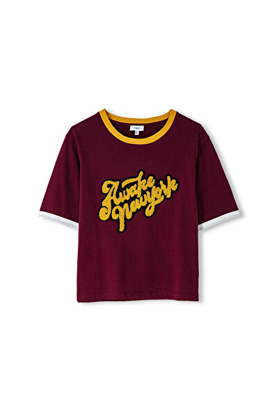 Twist Punch Applique T-Shirt - Stylish and Comfortable Design