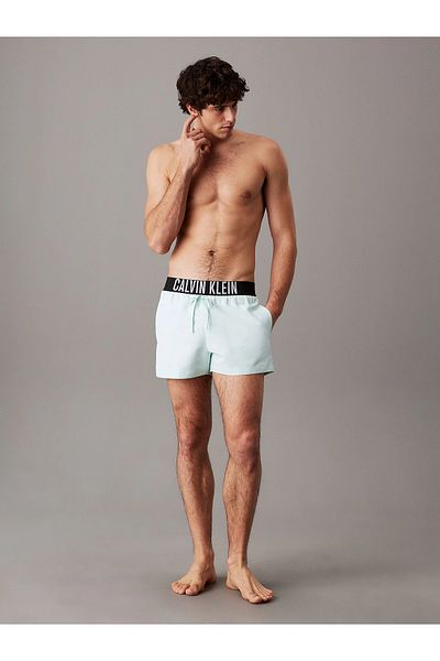 Calvin Klein Pánské tyrkysové šortky s elastickým pasem a stahovací šňůrkou Quick Dry Fabric KM0KM01094-CHJ