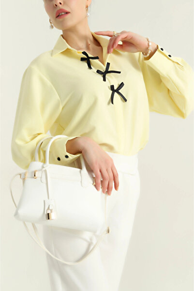 vuvutasarım قميص Aerobin نسائي بتفاصيل فيونكة صفراء للموسم الجديد