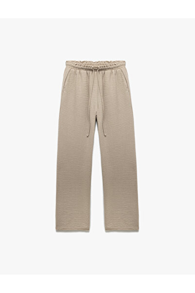 Koton Beli Bağlamalı Lastikli Cepli Bol Paça Pantolon