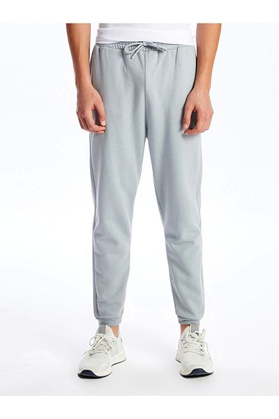 LC Waikiki Ανδρικό αθλητικό παντελόνι Jogger XSIDE ACTIVE Grey Slim Fit