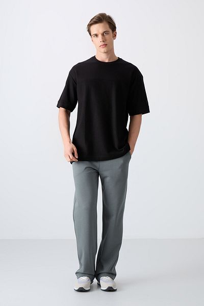 TOMMY LIFE Μαύρο ανδρικό μπλουζάκι Oversize με υφή χοντρή επιφάνεια - 88340