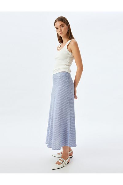 Koton Medium rise midi linen flared skirt.