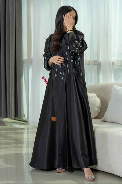 Zahya Abaya Toujan Cloche Abaya with embroidery inserts on the front and sleeves