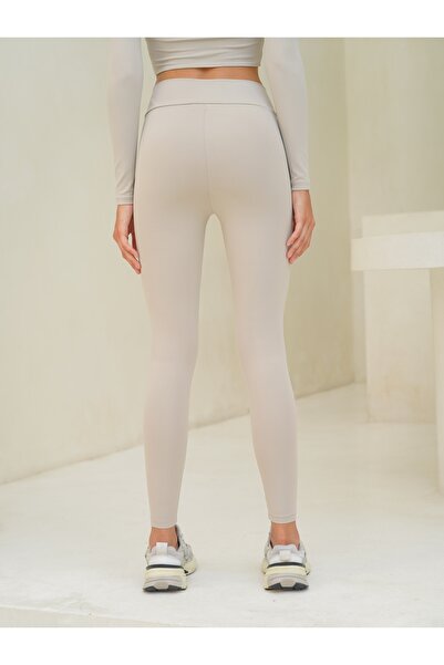 MAI STUDIOS CO. Dlouhé kamenné legíny Gaia Cross Detail