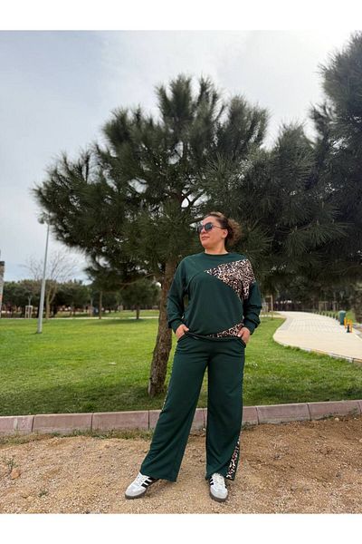 garajmood طقم أسود غير متماثل بتفاصيل جلد الفهد مقاس كبير من الأعلى إلى الأسفل