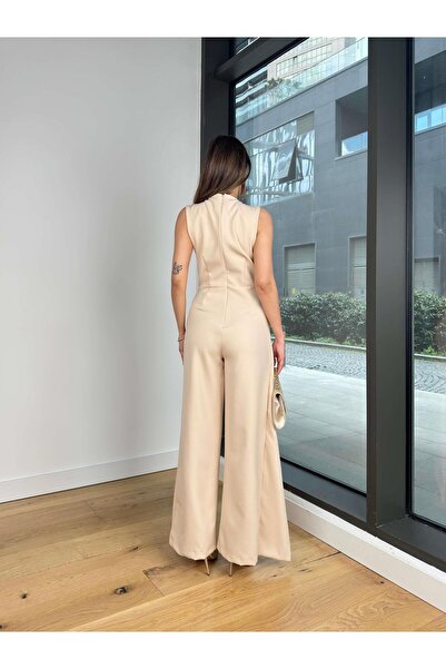 modaçelikler Kruvaze Yaka Aksesuar Detaylı Bol Paça Lisın Taş Kadın Tulum 25Y203