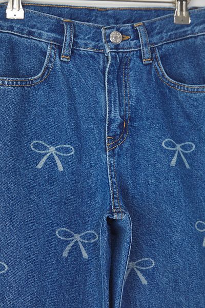 TRENDYOLKIDS Pantaloni din denim cu picioare largi pentru fete albastre, 100% bumbac, cu model de panglică