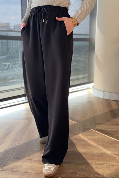 Ovn. Wide Leg Trousers with Cut Detail - Black
