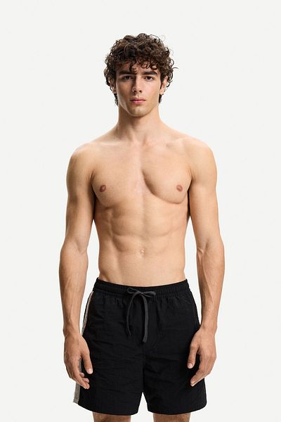 Bershka Boxy fit swimming trunks with stripes