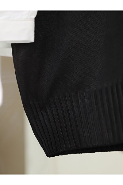 Modamorfo V-подібний трикотажний жилет на ґудзиках - чорний