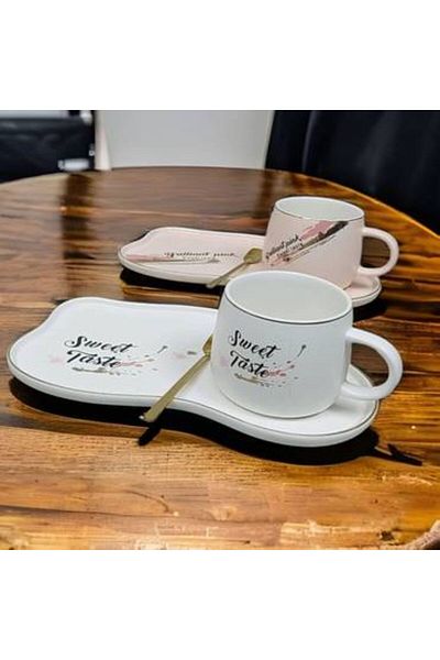 Generica A set of a cup, spoon and saucer, available in two colors: white and pink.