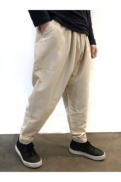 Reis Pantaloni largi plisați cu elastic - bej