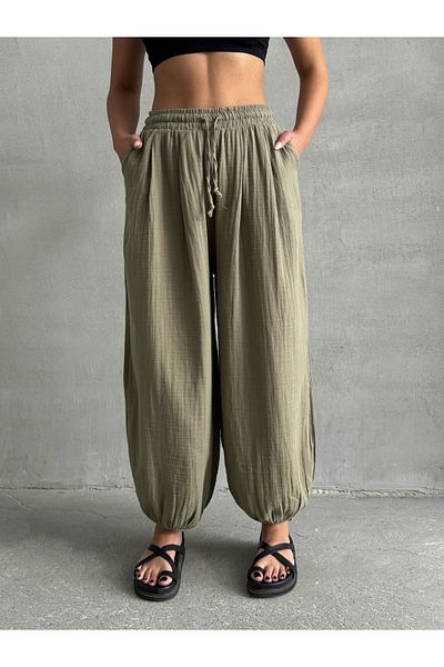 BEJNA Khakifarbene Shalwar-Hose aus Musselinstoff mit Taschen für Damen