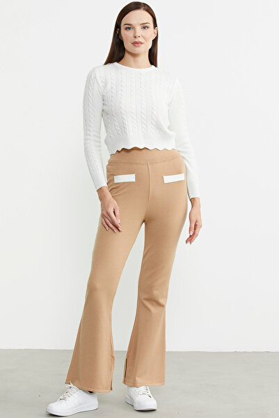 Sementa Бежеві трикотажні штани з розрізом на штанині в іспанському стилі