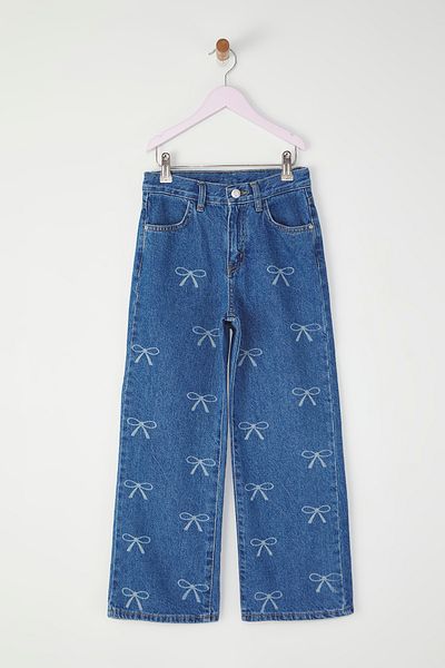 TRENDYOLKIDS Pantaloni din denim cu picioare largi pentru fete albastre, 100% bumbac, cu model de panglică