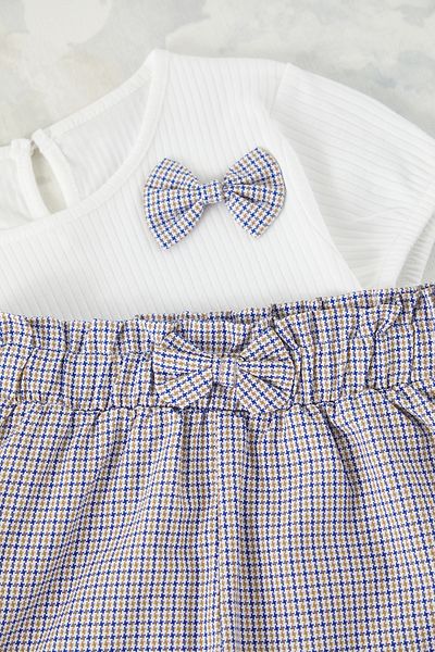 TRENDYOLKIDS Ecru Mädchen Baumwolle Schleife Detail T-Shirt-Shorts gestrickt Bottom-Top Anzug TKDSS25AU00062