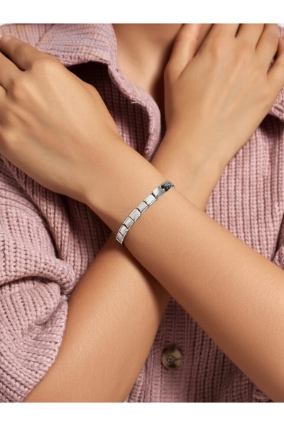 Valiant Gold سوار فولاذي نومي فضي اللون