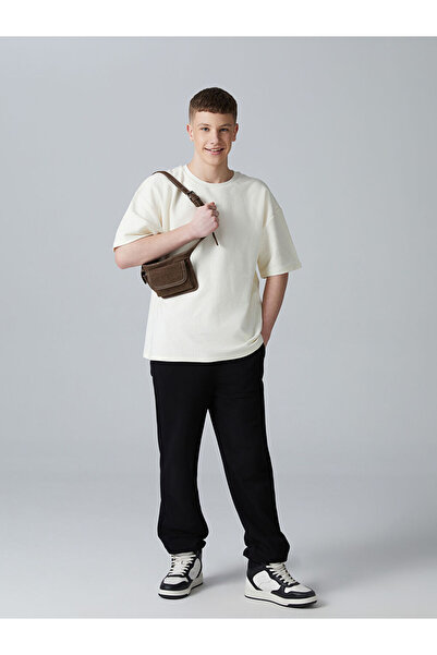 LC Waikiki بنطال شبابي منسوج بخصر مطاطي