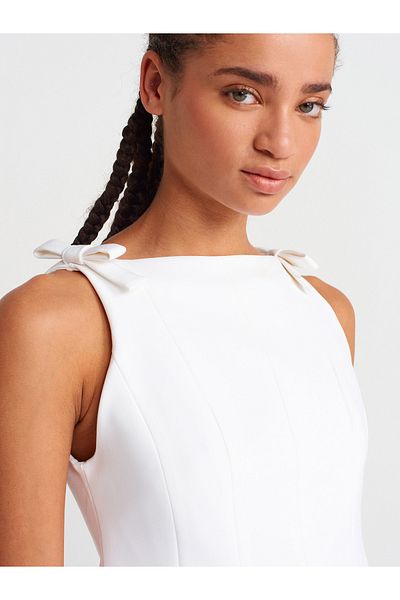Dilvin 50285 Bow Peplum Top-Ecru