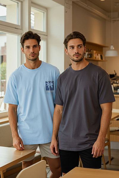 Trendyol Collection Blau-Anthrazit Oversize/Wide Cut 2er-Pack bedruckte, einfarbige T-Shirts aus 100 % Baumwolle TMNSS25TS00212