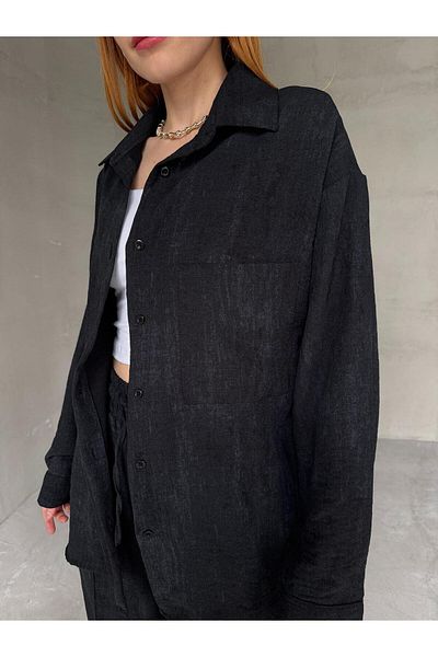 Cappmoda TKM-03659 قميص فضفاض بجيب من القماش المغسول باللون الأسود مع سروال مرن على شكل جزرة وخصر طقم مكون من قطعتين