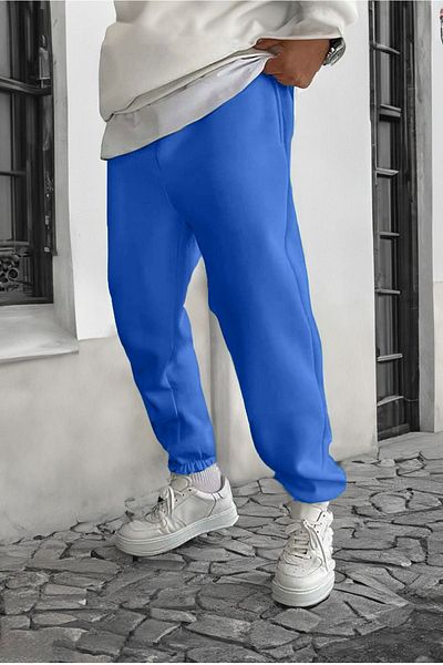 DUBU BUTİK Smile Face Sax Blue Jogger vékony melegítőnadrág – elasztikus lábnyomott, kényelmes stílus, lábnyomat részleteivel