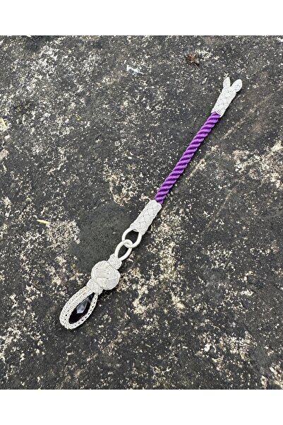 KAZZAZE Culoarea argintie Kazaziye este modelată cu piatră de zircon colorată...